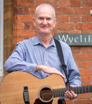 David Clifton in front of Wycliffe Hall sign